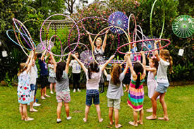 Kids birthday party ideas. Kids playing with hula hoops.