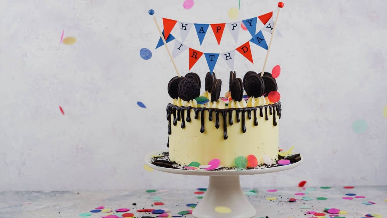 Birthday Cake Ideas. Cake with Oreos and Banner.